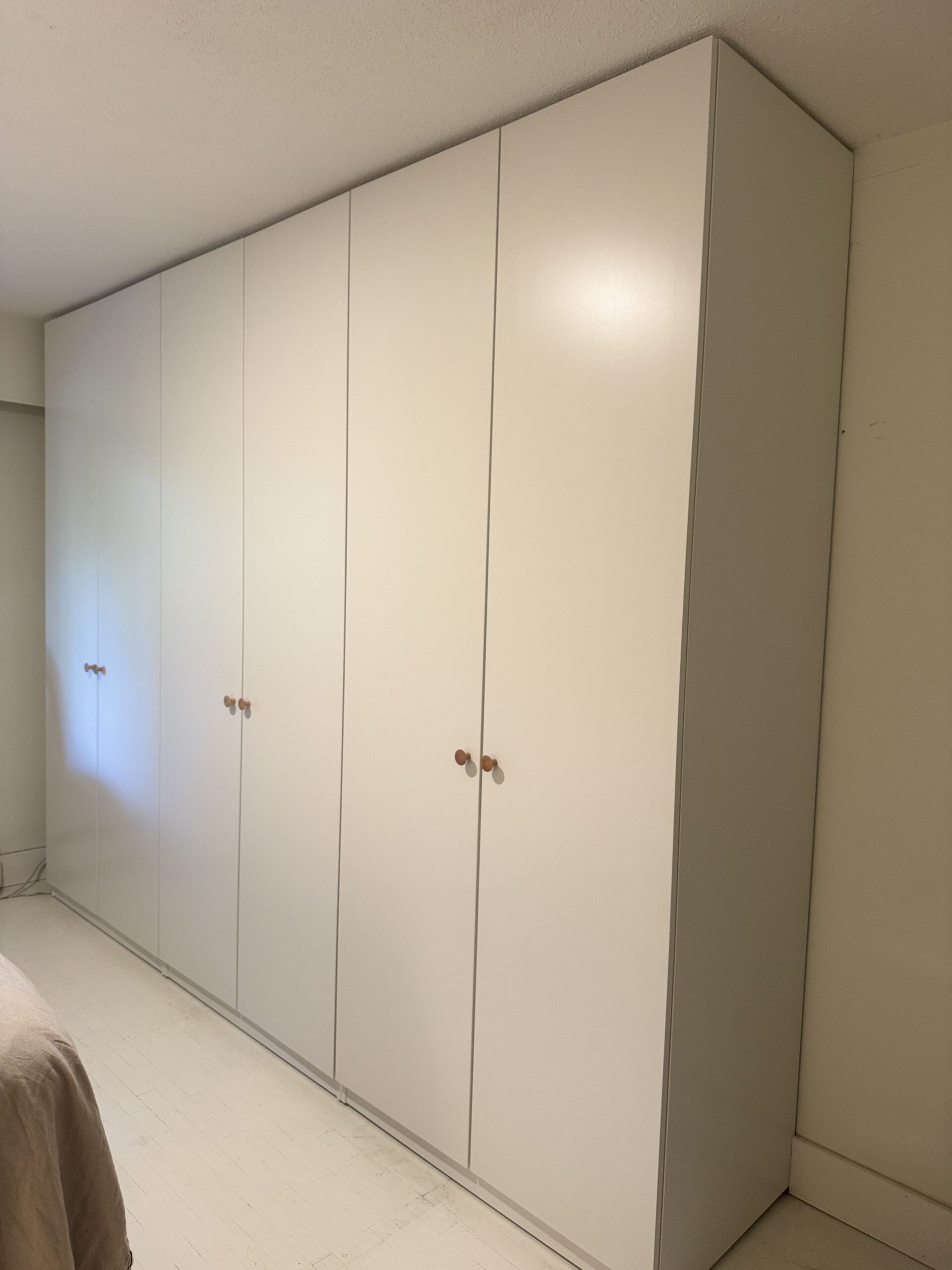 Completed IKEA PAX wardrobe installation in Vancouver exterior view with doors closed