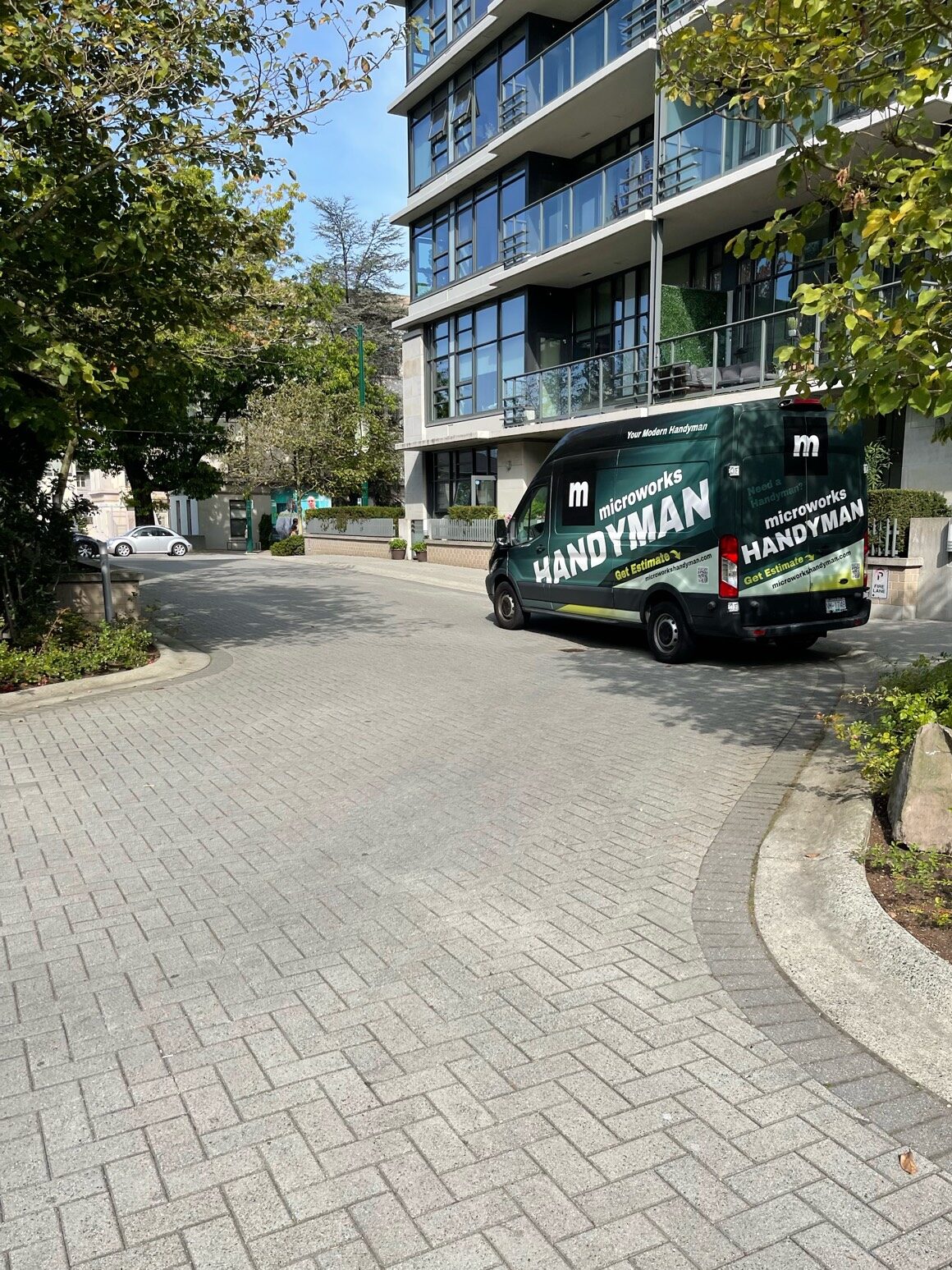 Photo of a van in front of a building