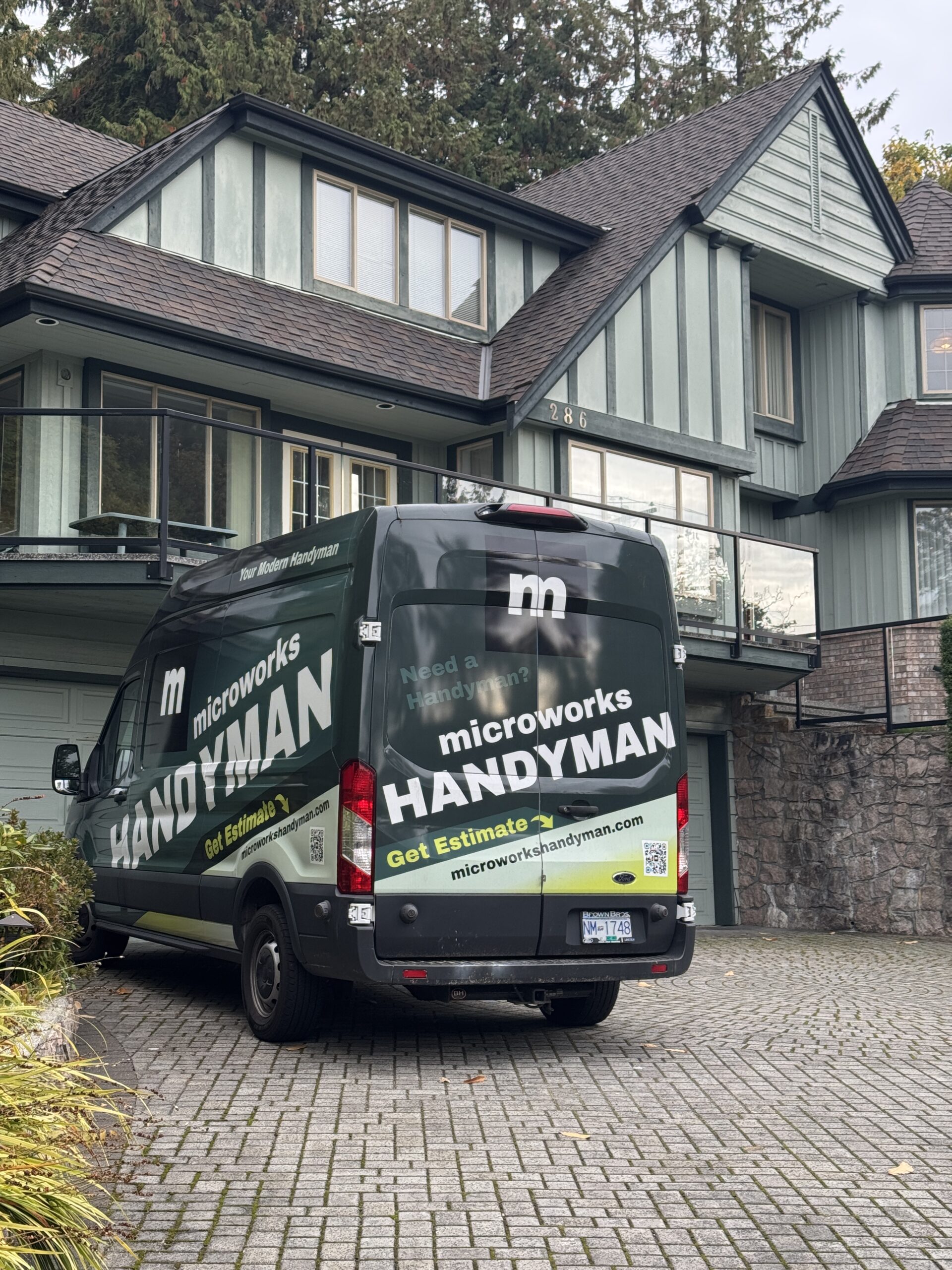 Handy van in front of a house